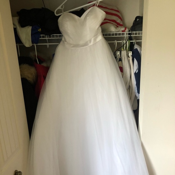 Wedding dress fits size 8 to 12 because of the adjustable back clean dress - Picture 11 of 11